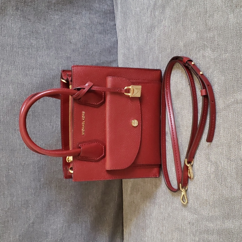Michael Kors Mercer Medium Pebbled Leather Pocket Tote Bag in a burgundy color